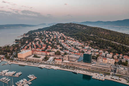 Aerial drone shot of buildings on Marjan hill in Split during sunrise hour in Croatiaの写真素材