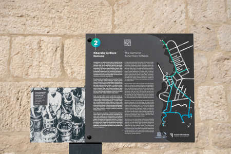 Komiza, Croatia - Aug 16, 2020: Information board of geography in Komiza area in Croatiaのeditorial素材