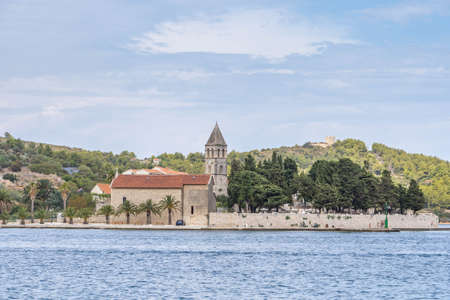 Vis, Croatia - Aug 18, 2020: St Jeronima church on peninsula near old town in summerのeditorial素材