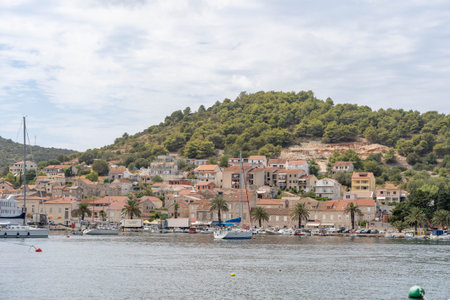 Vis, Croatia - Aug 18, 2020: Riva by old town port in summer middle day