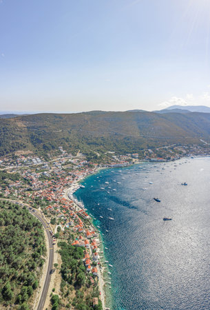 Aerial drone shot of town port Adriatic coastline on Vis Island in Croatia summerの写真素材