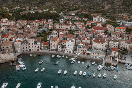 Aerial view of beach in Komiza town port on Vis Islandの写真素材