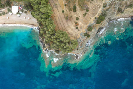 Aerial overhead drone shot of Adriatic coastline in Komiza town on Vis Island in Croatia summerの写真素材
