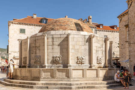 Dubrovnik, Croatia - Aug 20, 2020: Onofrios Fountain in old town main streetのeditorial素材