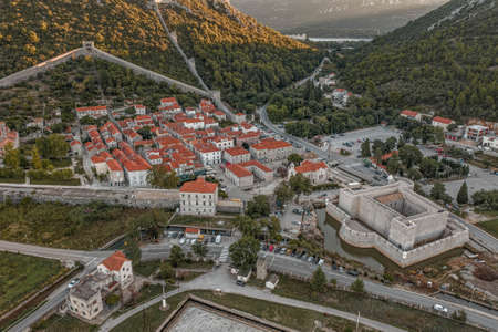 Aerial drone shot of walled city of Ston near Ragusa Dubrovnik in Croatia summer sunriseの写真素材