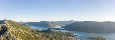 Aerial panorama drone shot of City Wall of Ston in Mali Ston near Dubrovnik in Croatia summer sunriseの写真素材