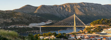 Panorama view of Dubrovnik bridge with mountain ranga Dalamatia coast in Croatia summer