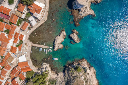Aerial drone shot of West pier in Dubrovnic west pier in Croatia summer noonの写真素材