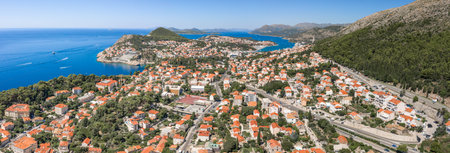 Aerial panorama drone shot of West Dubrovnik town by Adriatic sea in Croatia summer noonの写真素材