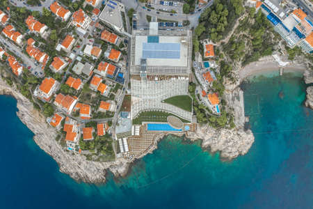 Dubrovnik, Croatia - Aug 22, 2020: Aerial ovheard drone shot of Rixos Premium resort hotel empty in summer sunriseのeditorial素材