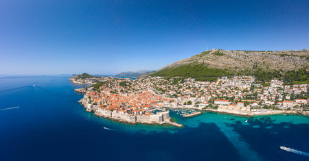 Aerial drone shot of Old Port in Dubrovnik old town in Croatia summer midday noonの写真素材