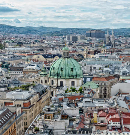 View of Peterskirche from the top of Stephansdom in the historic old town of Vienna, Austriaの写真素材
