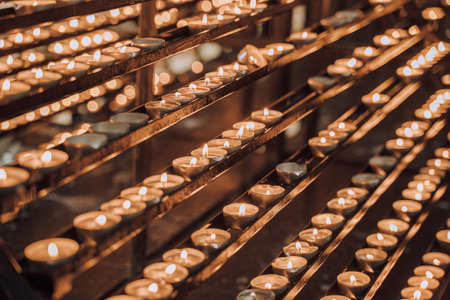 Vienna, Austria - April 27, 2019: Tiny memorial candles lit in Stephansdom in Vienna, Austriaのeditorial素材