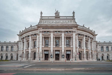 Vienna, Austria - Feb 7, 2020:Facade empty view of baroque style Burgtheater in front of city hall in winter morningのeditorial素材