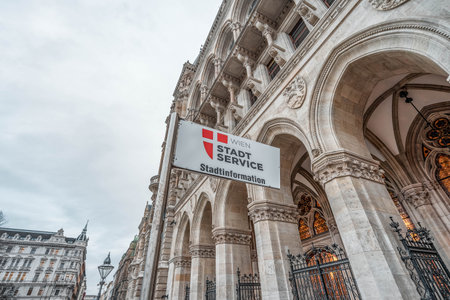 Vienna, Austria - Feb 7, 2020: Bus stop outside porch passage of city hall in winter morningのeditorial素材