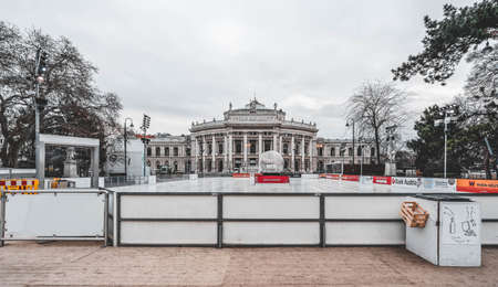 Vienna, Austria - Feb 7, 2020: Empty rink outside city hall with view of Burgtheater accross the streetのeditorial素材