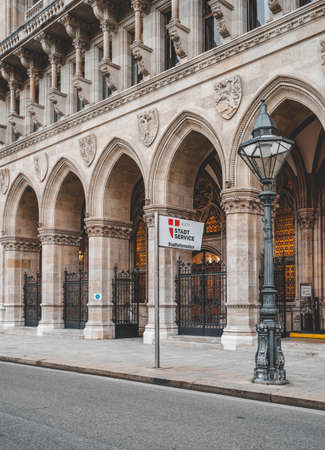 Vienna, Austria - Feb 7, 2020: Bus stop outside porch passage of city hall in winter morningのeditorial素材
