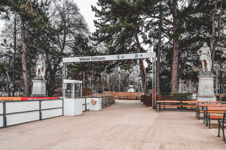 Vienna, Austria - Feb 7, 2020: Entrance to empty rink outside city hall with view of Burgtheater accross the streetのeditorial素材
