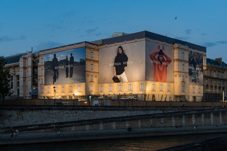 Paris, France - August 2, 2024: Bottega Veneta ads with Jacob Elordi on Cour de Cassation Facade, Palais de Justiceのeditorial素材