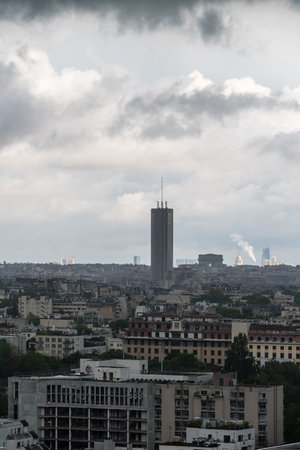 Paris, France - May 7, 2023: Hyatt Regency tower with Arc de Triompthe with storm in distanceのeditorial素材