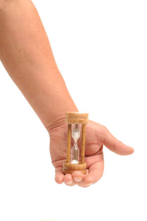 Hand holding egg timerの写真素材