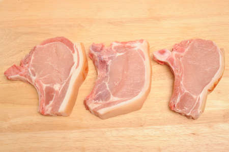 Raw pork chopsの写真素材