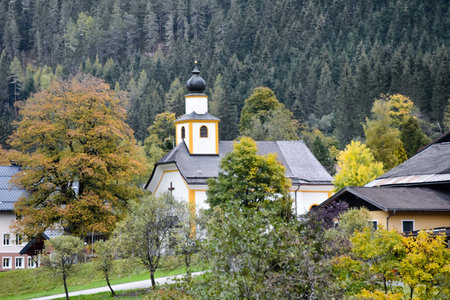 A small church in Austria with trees
