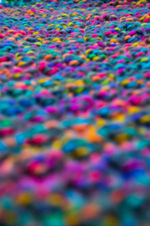 The structure of a colorful knitted scarfの写真素材