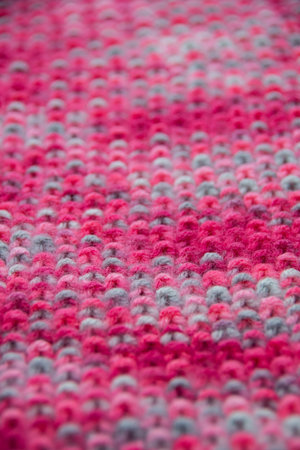 The structure of a colorful knitted scarf
