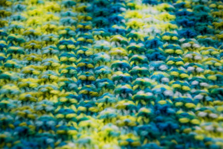The structure of a colorful knitted scarfの写真素材