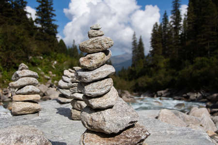 Stacked stones on the "Krimmler Ache"の写真素材