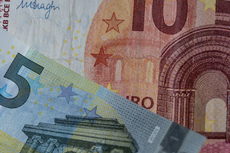 Macro shot of a 5 and 10 euro note