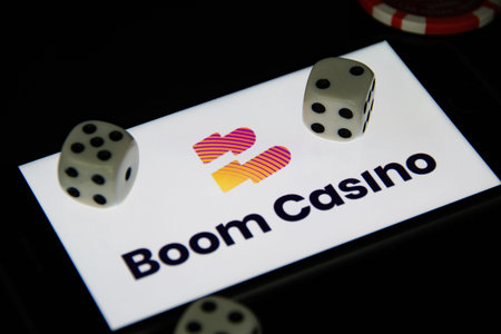 Rheinbach, Germany 4 May 2021, Close-up of the Boom Casino logo with some dice