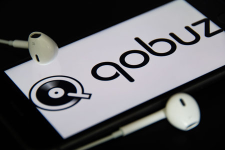 Rheinbach, Germany 4 May 2021, Close-up of the Qobuz logo on the screen of a smartphone with...