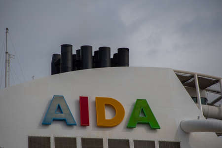 WarnemÃ¼nde, Germany 23 June 2021, The chimney of a cruise ship owned by the shipping company "AIDA"のeditorial素材