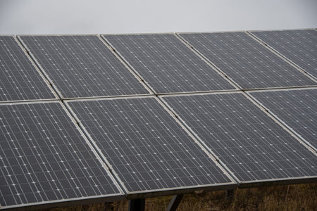 Solar panels installed on the roof of a house. Alternative energy.