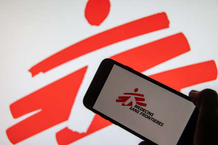 Rheinbach, Germany 15 January 2022, The brand logo of "Medecins Sans Frontieres" on the display of a smartphone (focus on brand logo)のeditorial素材