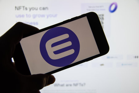 Rheinbach, Germany 15 February 2022, The logo of the cryptocurrency "Enjin Coin" on the display of a smartphone (focus on brand logo)のeditorial素材
