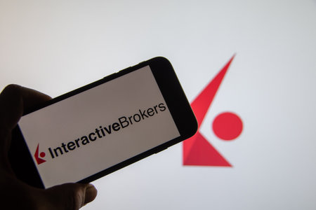 Rheinbach, Germany 14 February 2022, The brand logo of the broker company "Interactive Brokers" on the display of a smartphone (focus on brand logo)のeditorial素材