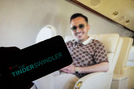 Rheinbach, Germany February 24, 2022, The logo of the new Netflix film The Tinder Swindler on the...