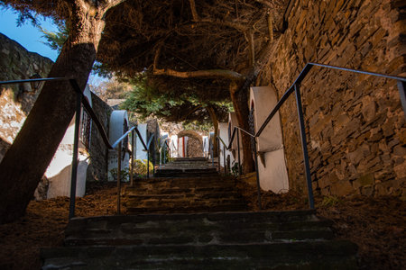 Narrow alley with stairs in an old town