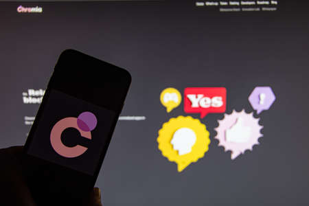 Rheinbach, Germany April 1, 2022, The logo of the cryptocurrency "Chromia" on the display of a smartphone in front of the website (focus on the brand logo)のeditorial素材