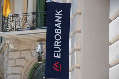 Heraklion, Greece 15 May 2022, The brand logo of "Eurobank Ergasias" in front of a branch in Heraklionのeditorial素材