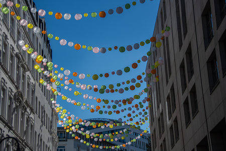 A street decorated with garlands in downtown Hamburgのeditorial素材