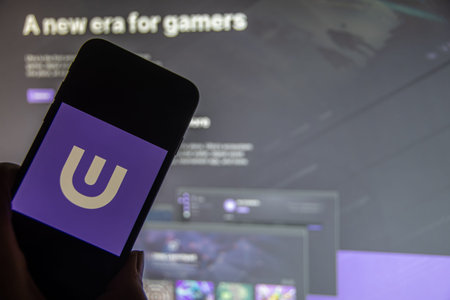 Rheinbach, Germany 20 December 2022, The logo of the cryptocurrency Ultra (UOS) on the display of a...