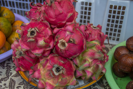 Dragon fruit, snake fruit and oranges at a local Balinese marketの写真素材