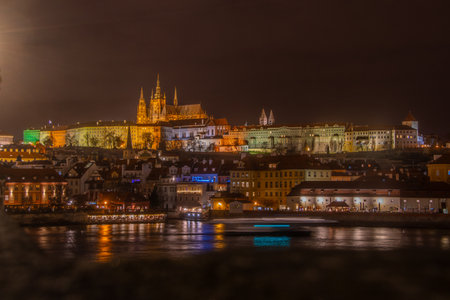 Prague, Czech Republic December 12, 2023, The view of the illuminated Prague Castle at nightの写真素材