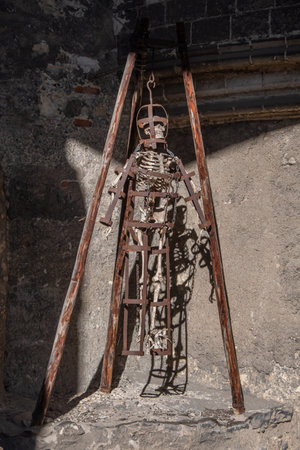A skeleton in a medieval torture machineの写真素材