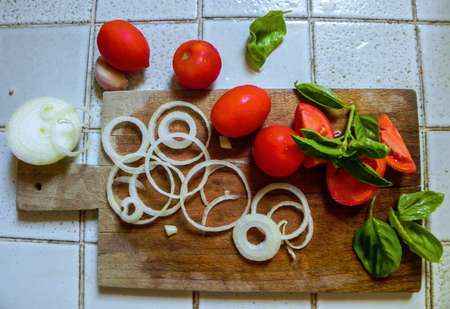 mixed vegetables on cutting boardの写真素材