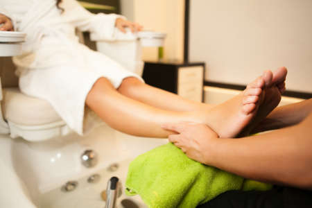 Feet massage during spa treatmen の写真素材